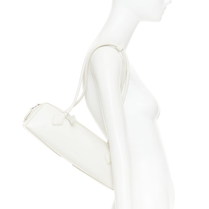 ALAIA Le Teckel Medium off white goat leather long handle east west shoulder bag