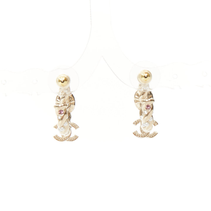 CHANEL 2023 Runway pink stone twisted chain CC crystal rhinestone hoop earrings