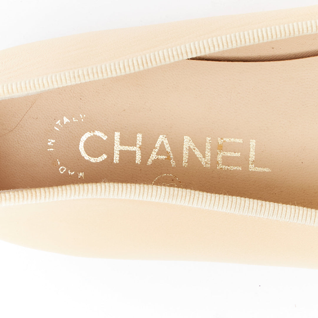 CHANEL cream black leather CC logo two tone monochrome toe cap flats EU37
