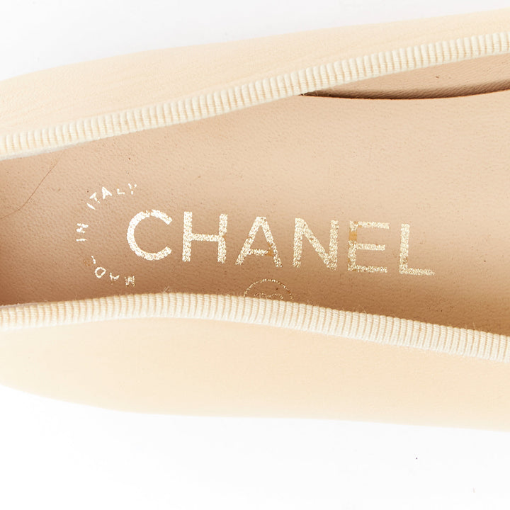 CHANEL cream black leather CC logo two tone monochrome toe cap flats EU37