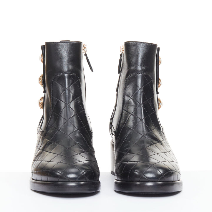 CHANEL 17A Paris Cosmopolite black lamb quilted pearl button ankle boots EU39.5