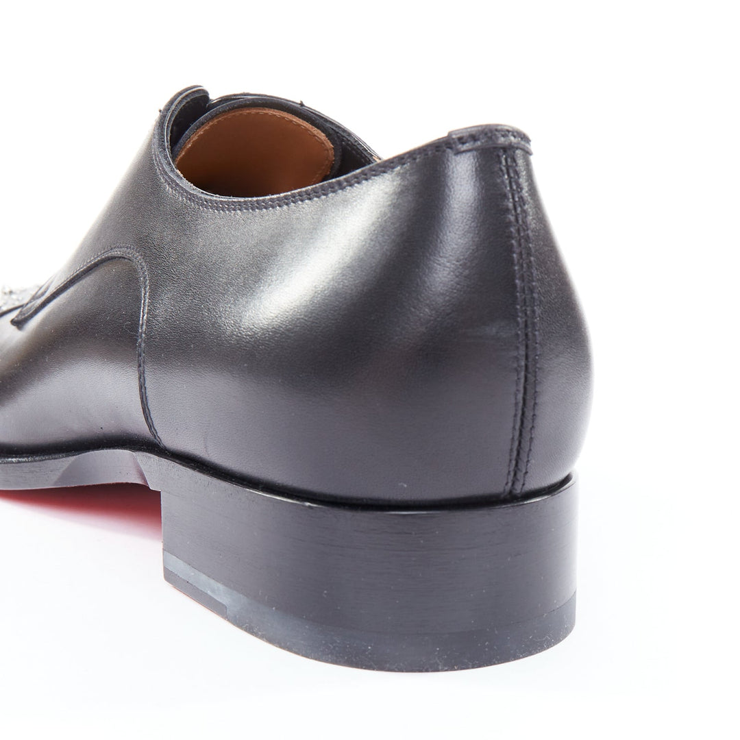 Male mannequin wearing Christian Louboutin Maltese Black Leather Men Loafer in Size EU43 | Available at JHROP