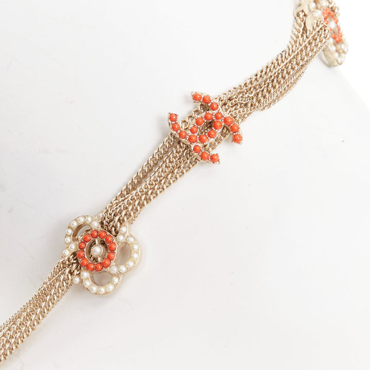 CHANEL A16P gold tone Camellia floral pearl fringe CC station sautoir necklac