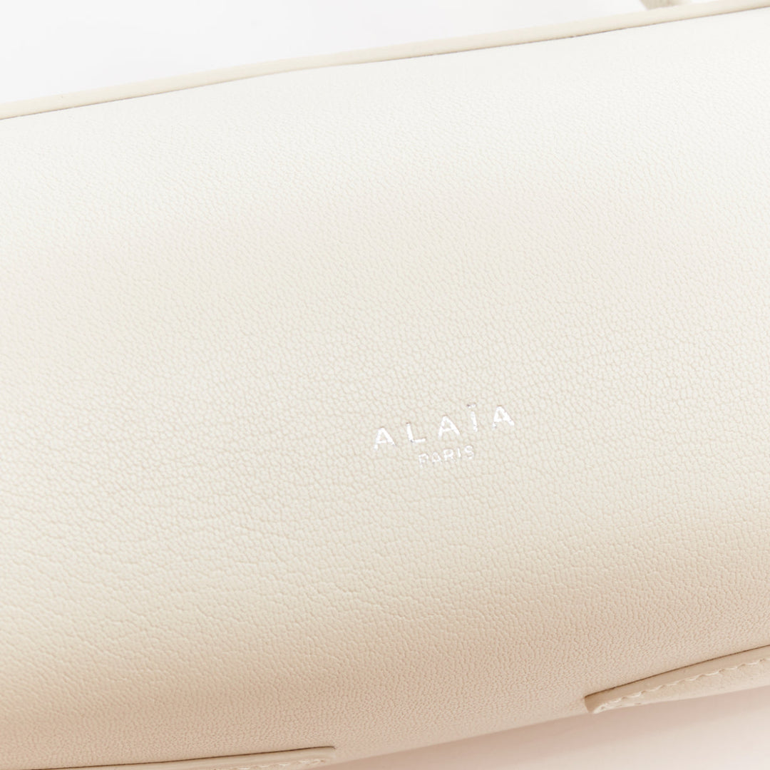 ALAIA Le Teckel Medium off white goat leather long handle east west shoulder bag