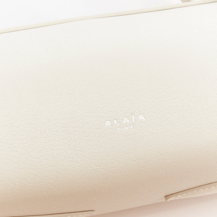 ALAIA Le Teckel Medium off white goat leather long handle east west shoulder bag