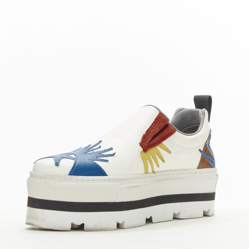 Female mannequin wearing MSGM White Leather Women Sneakers in Size EU36 | Available at JHROP