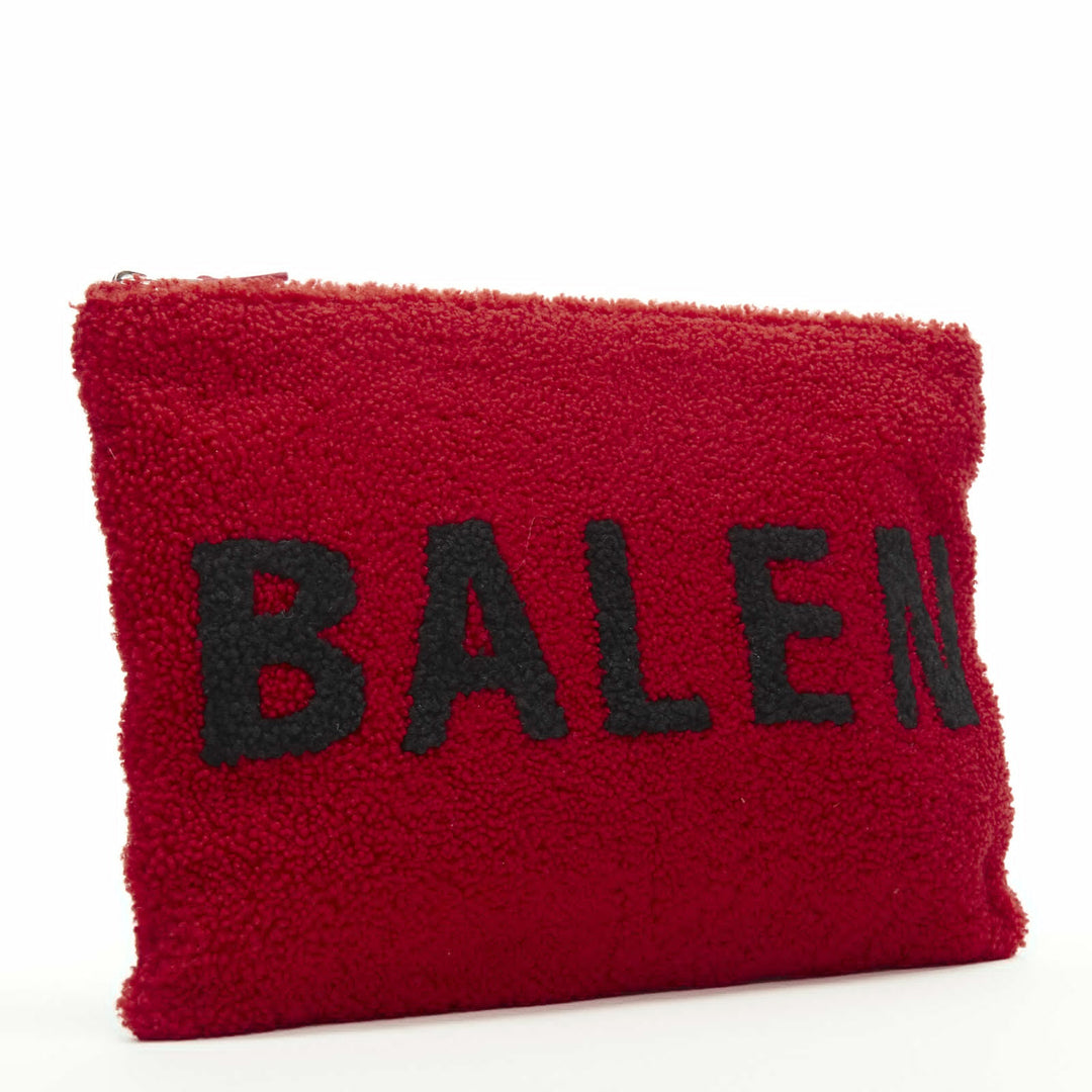 BALENCIAGA Demna logo red black dyed merino lamb shearling zip clutch bag