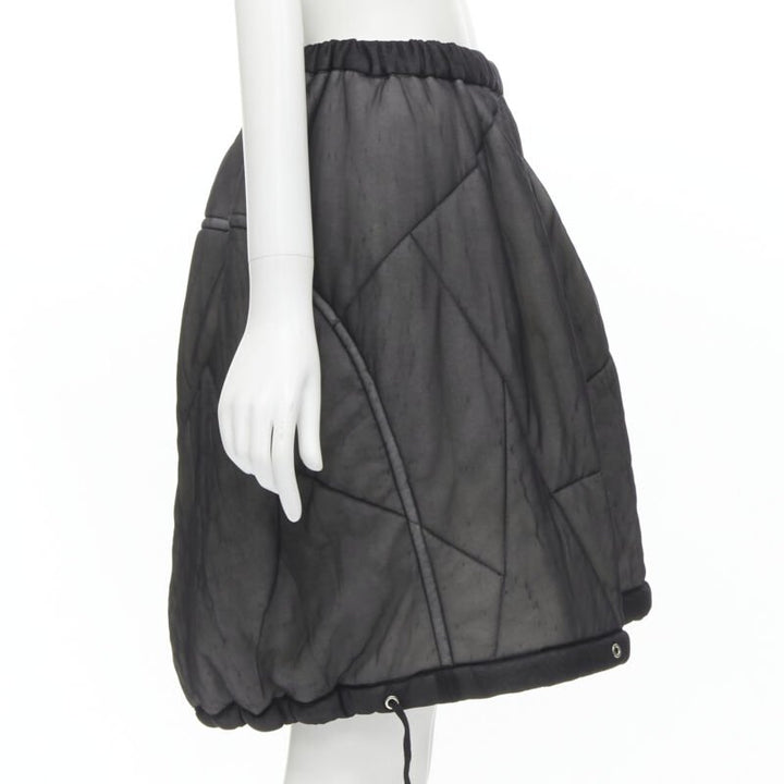 Female mannequin wearing Comme Des Garcons by Rei Kawakubo 1990 Black Nylon Women Skirt in Size  M | Available at JHROP