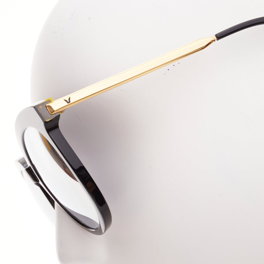 GENTLE MONSTER Lovesome black reflective lens gold oversized sunglasses