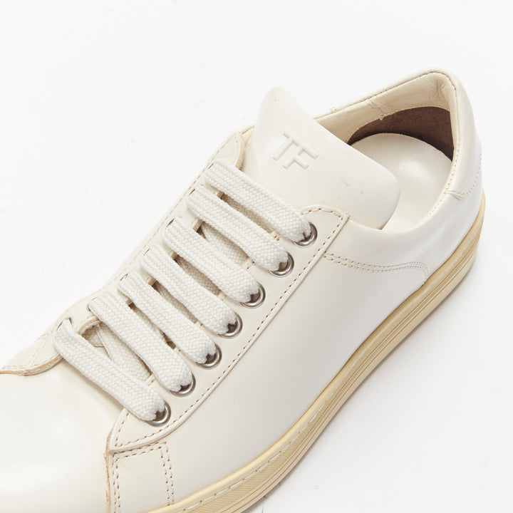 Female mannequin wearing Tom Ford Cream Leather Women Sneakers in Size EU36 | Available at JHROP