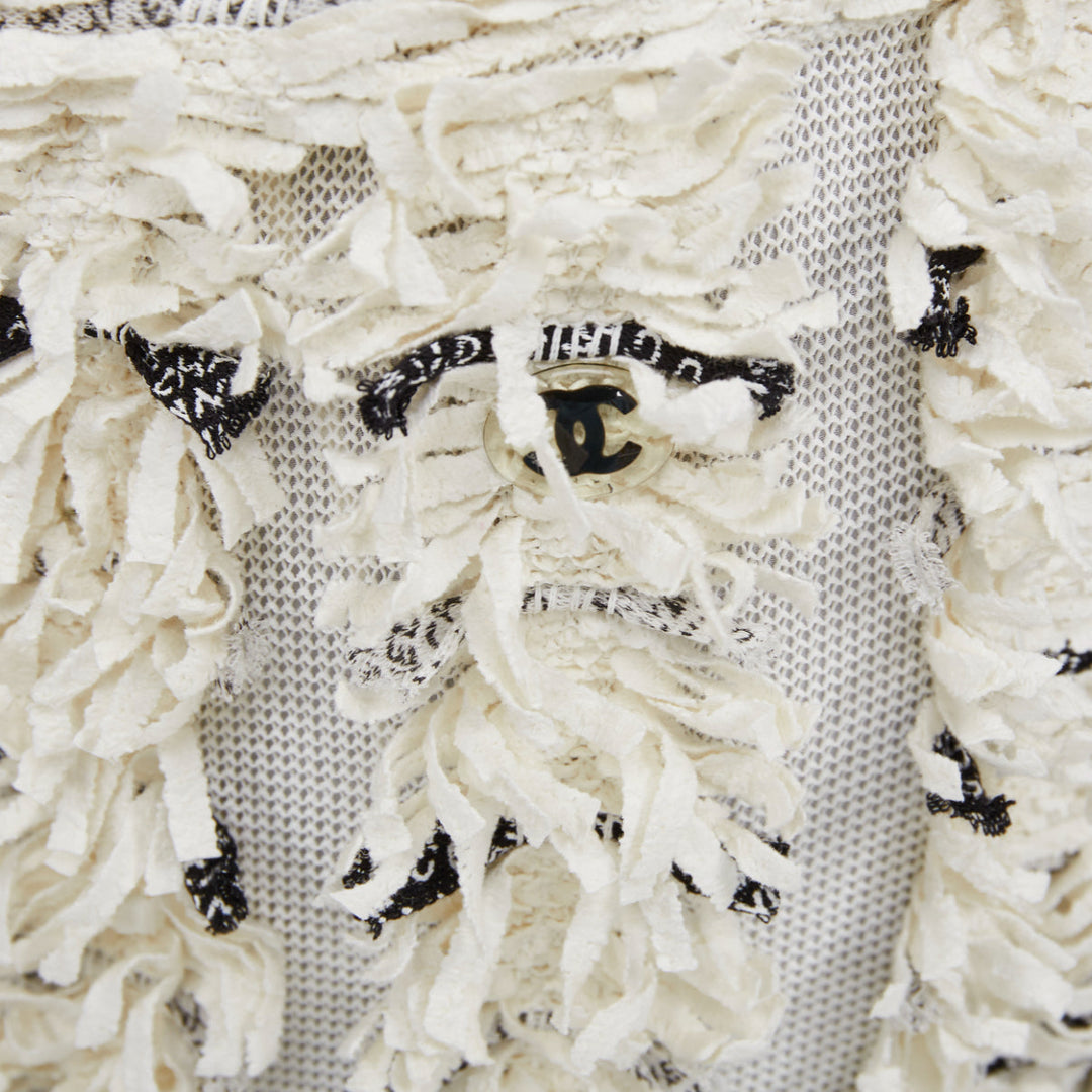 CHANEL 18P Runway cream black logo print tweed A-line skirt FR38 M