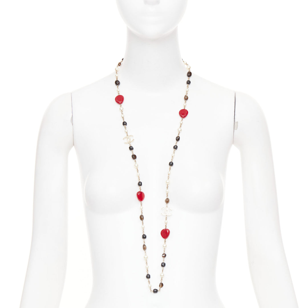 CHANEL A14C red black resin faux pearl CC logo station chain sautoir necklace