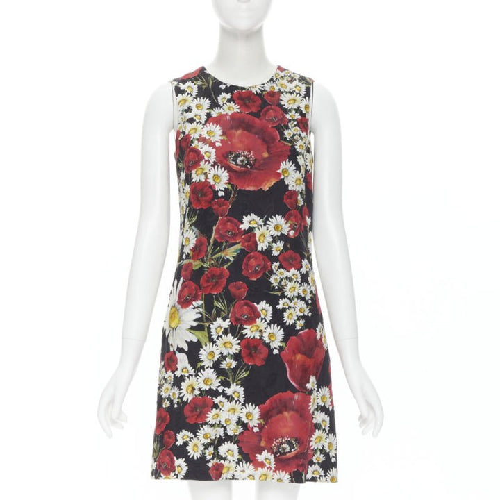 Female mannequin wearing Dolce Gabbana Poppy daisy jacquard dress Black Cotton Women Cocktail Dresses in Size IT36 | Available at JHROP