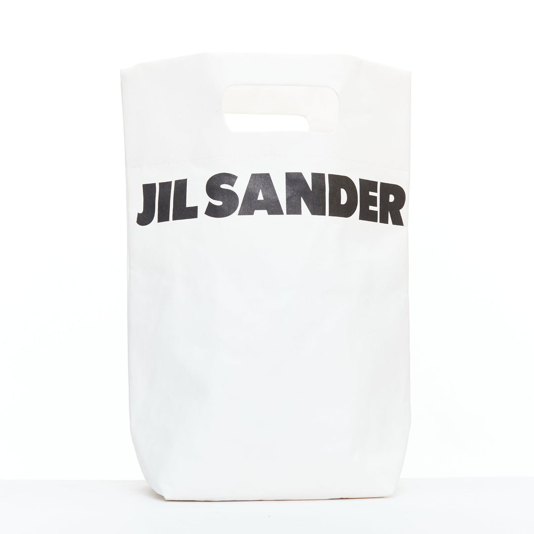 JIL SANDER cream black laminated paper logo crossbody tote bag