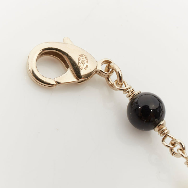 CHANEL 10C Runway CC Logo Faux Pearl Sautoir coco figurine charm necklace