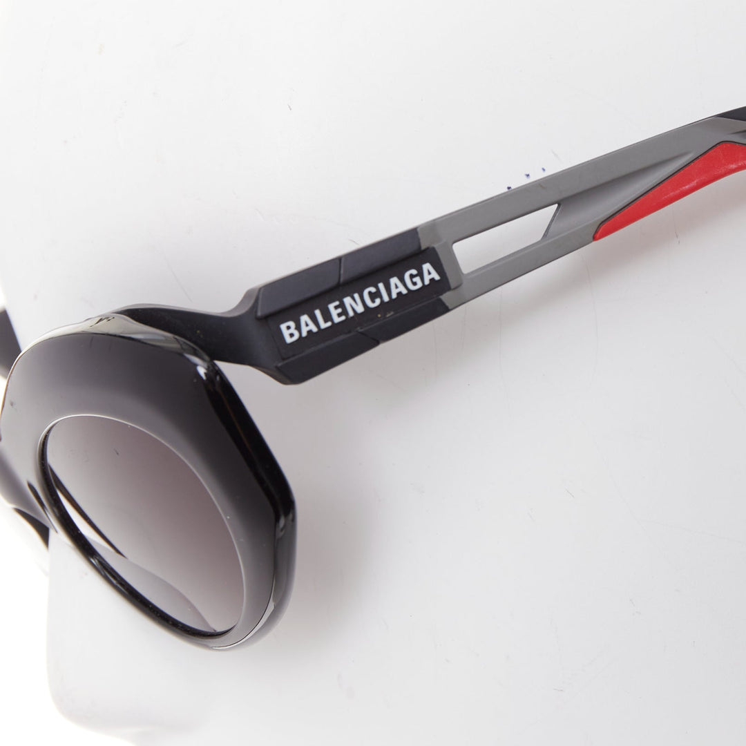 BALENCIAGA BB0053S Hybrid Oval black grey sporty rubber temple sunglasses