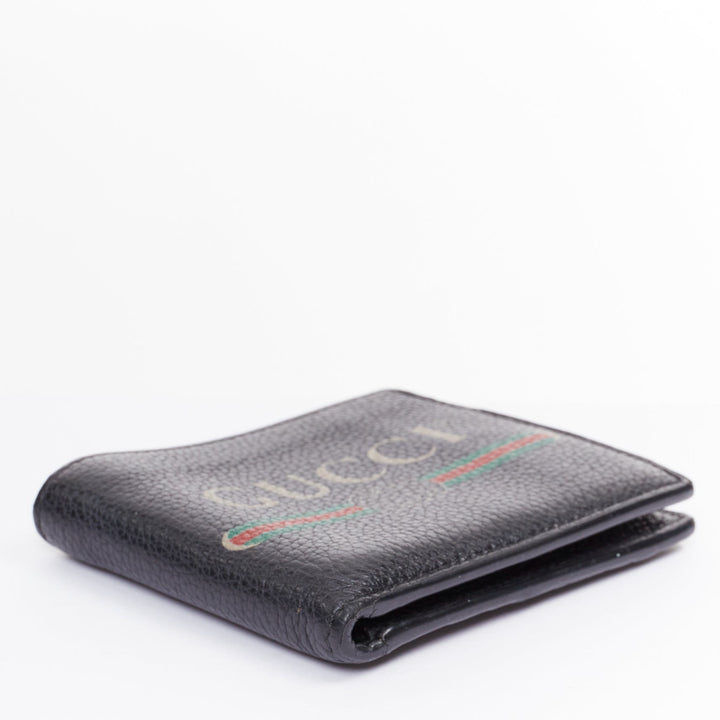 GUCCI black grained leather vintage logo bifold wallet