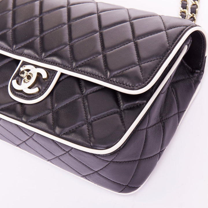 CHANEL 2025 Graphic Frame black quilted lambskin piping mini square flap bag