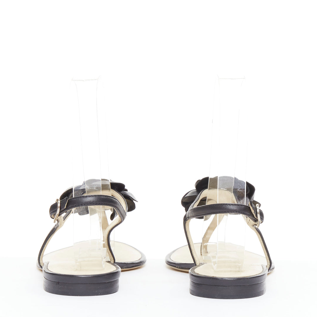 CHANEL black leather silver CC logo camellia flat T strap sandals EU37.5