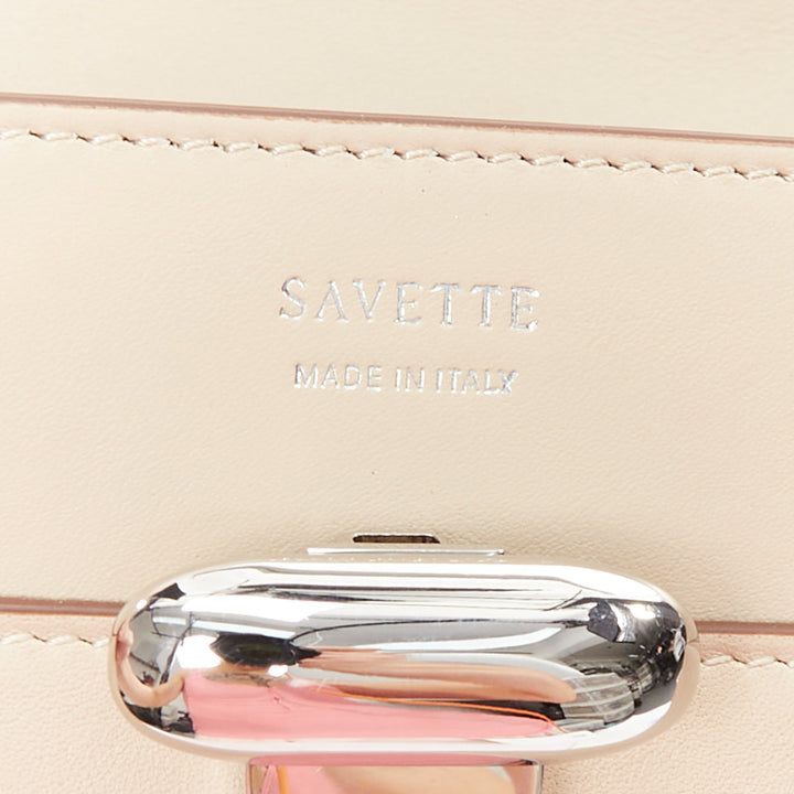 SAVETTE Symmetry beige silver buckle elongated pochette top handle bag