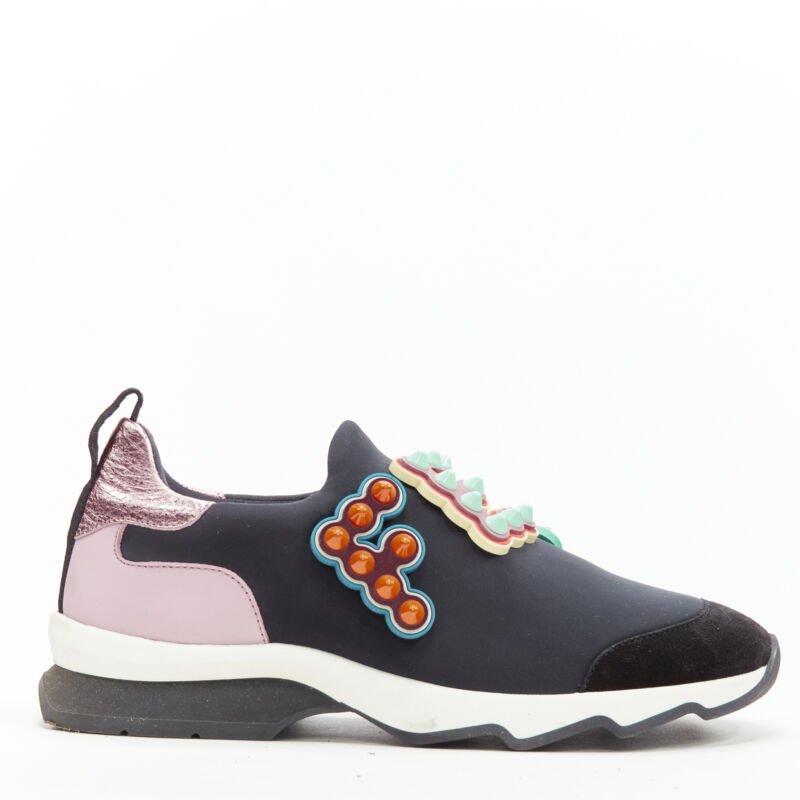 Female mannequin wearing Fendi Fun Fair Black Neoprene Women Sneakers in Size EU36 | Available at JHROP