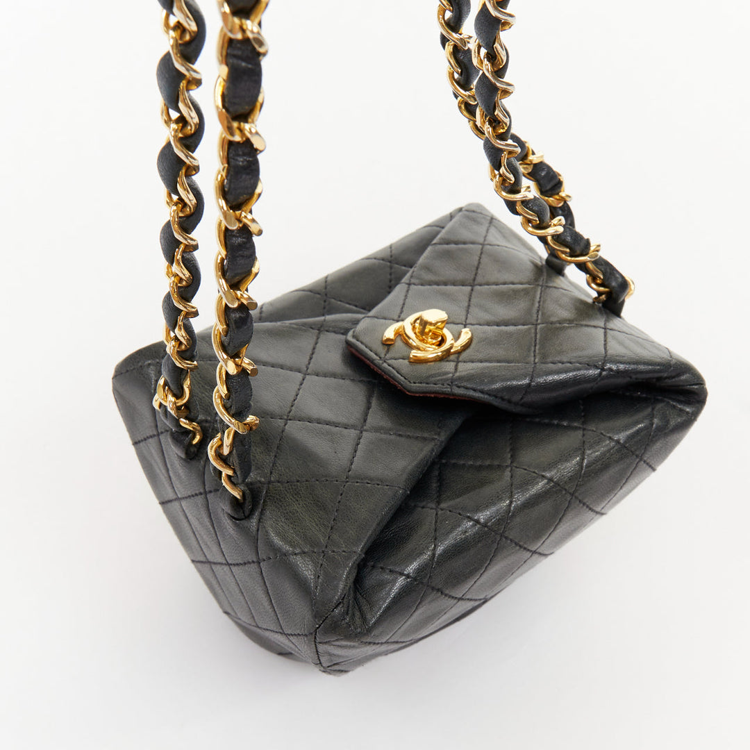CHANEL 1990 Foldover Diamond Quilted dark grey lambskin mini bucket bag