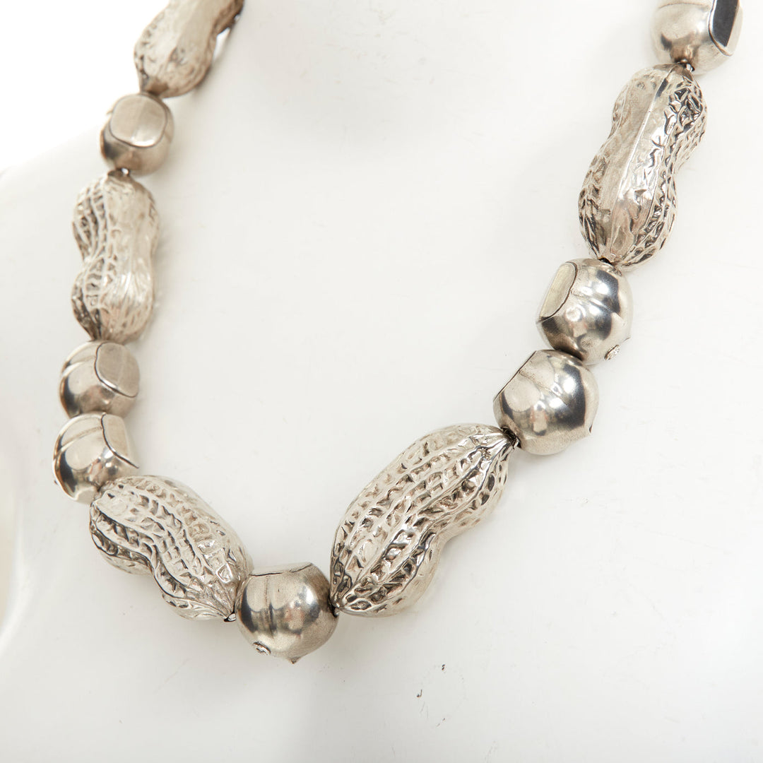 GUCCI Runway hazelnut peanut charm textured interlocking GG silver tone necklace