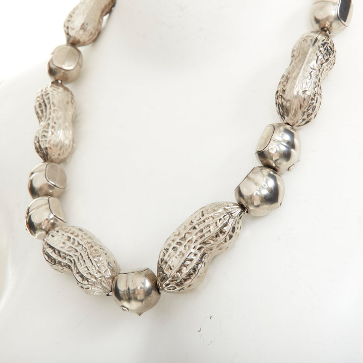 GUCCI Runway hazelnut peanut charm textured interlocking GG silver tone necklace