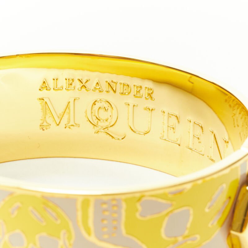 ALEXANDER MCQUEEN beige yellow skull enamel gold tone brass bangle cuff