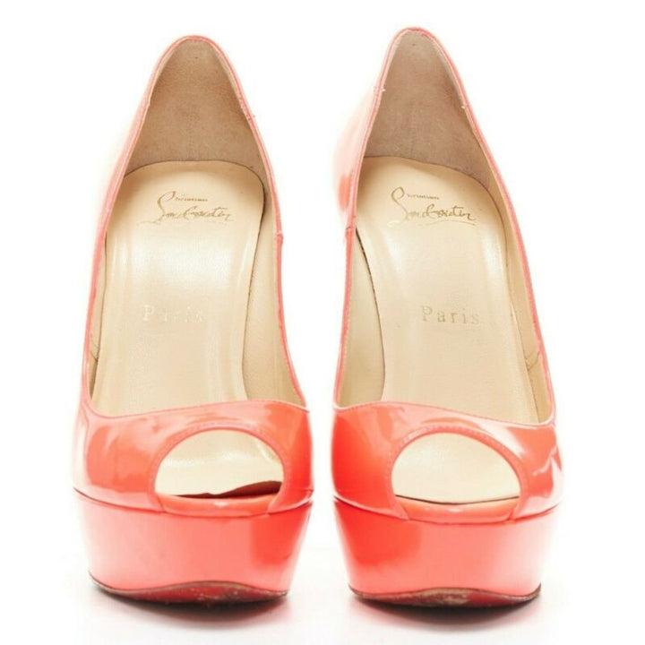 Female mannequin wearing Christian Louboutin Lady Peep 130 Pink Patent Leather Women Heels in Size EU36 | Available at JHROP