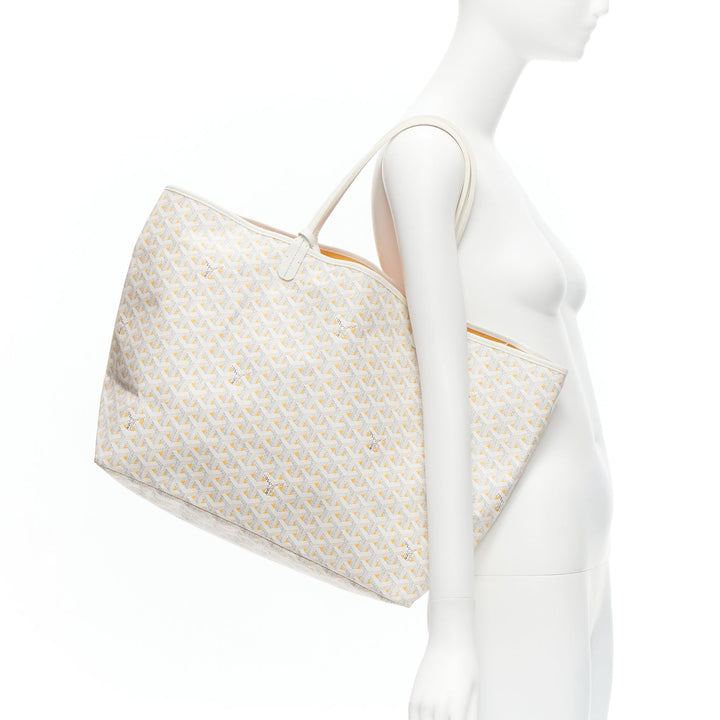 Female mannequin wearing Goyard Saint Louis GM White Canvas Women Bag in Size  | Available at JHROP