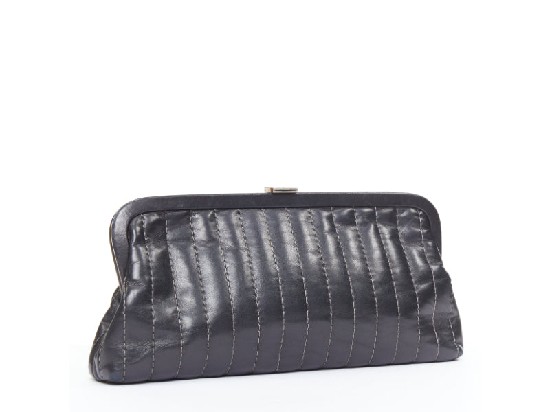CHANEL 2005 Mademoiselle Ligne black vertical quilt lambskin kisslock clutch bag