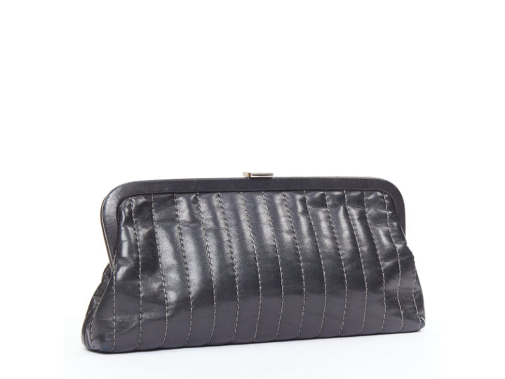 CHANEL 2005 Mademoiselle Ligne black vertical quilt lambskin kisslock clutch bag