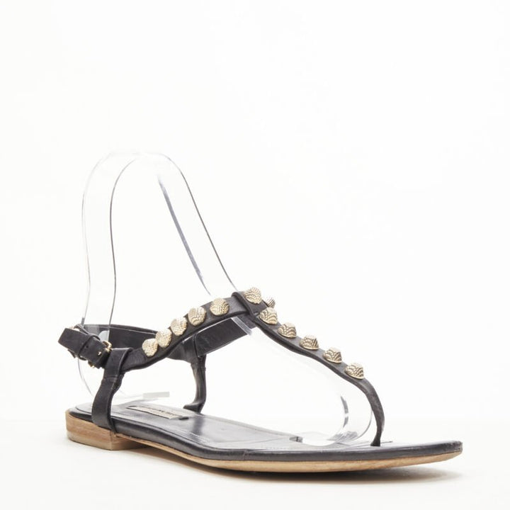 BALENCIAGA Cagole black leather gold textured  stud T-strap flat sandals EU38