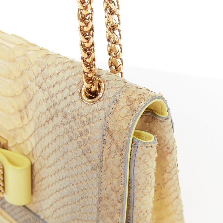 CHRISTIAN LOUBOUTIN Sweet Charity grey yellow gold stud bow chain shoulder bag