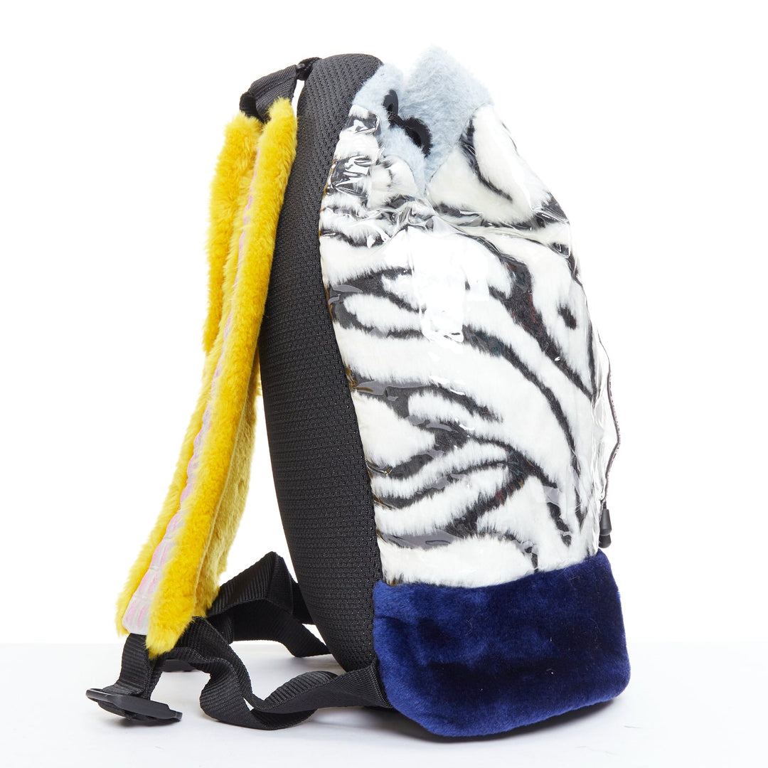 NASIR MAZHAR black white blue yellow faux fur logo tape backpack