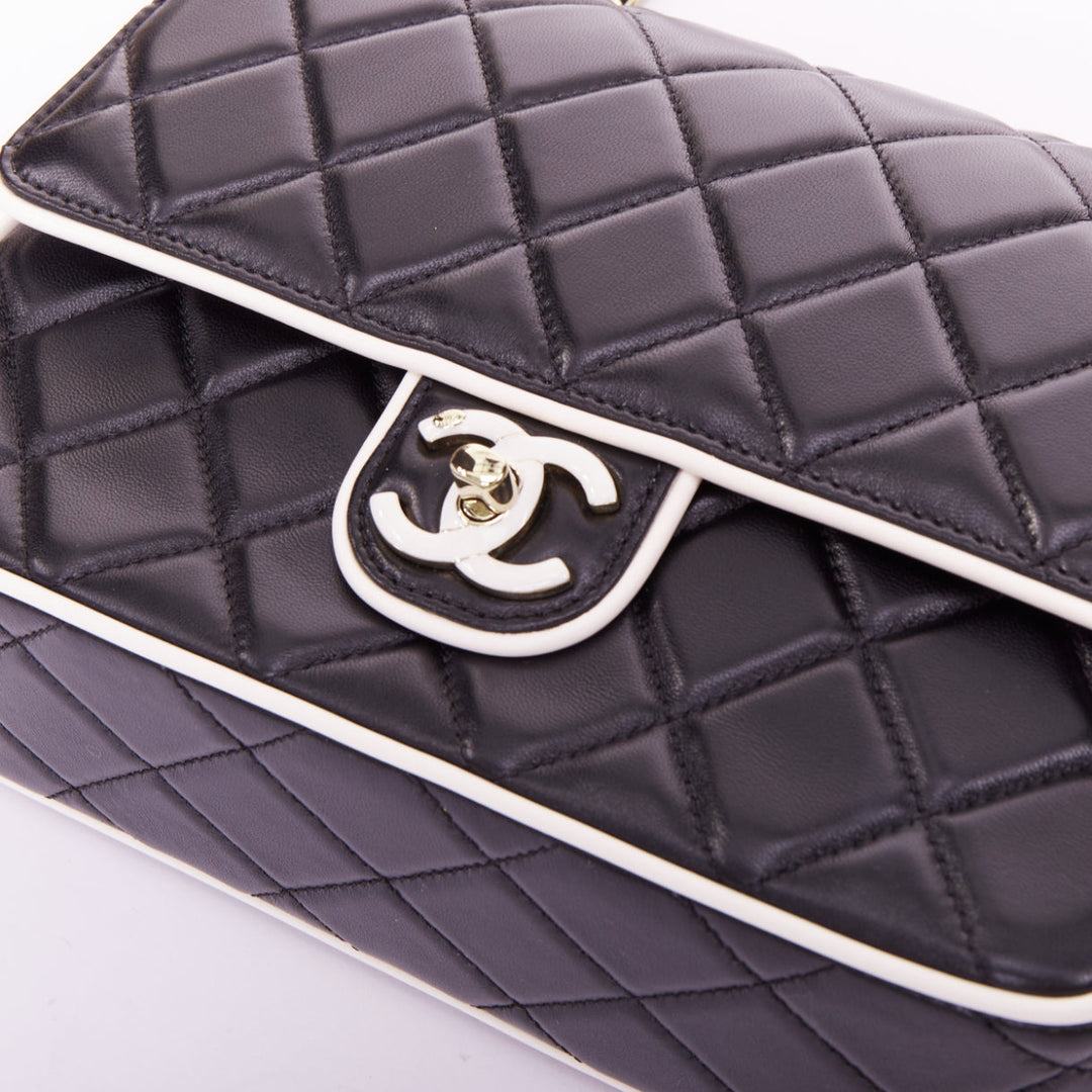 CHANEL 2025 Graphic Frame black quilted lambskin piping mini square flap bag