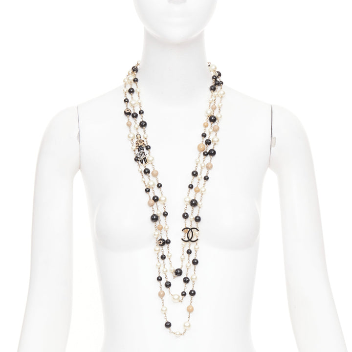 CHANEL B14C Coco Mademoiselle Figure black beige pearl triple sautoir necklace