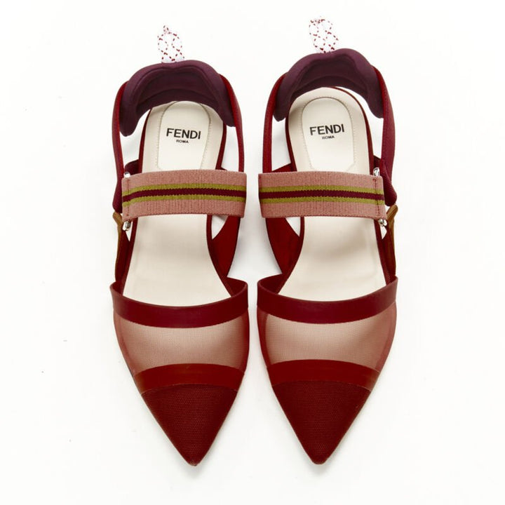 Female mannequin wearing Fendi Colibri Red Fabric Women Flats in Size EU36.5 | Available at JHROP