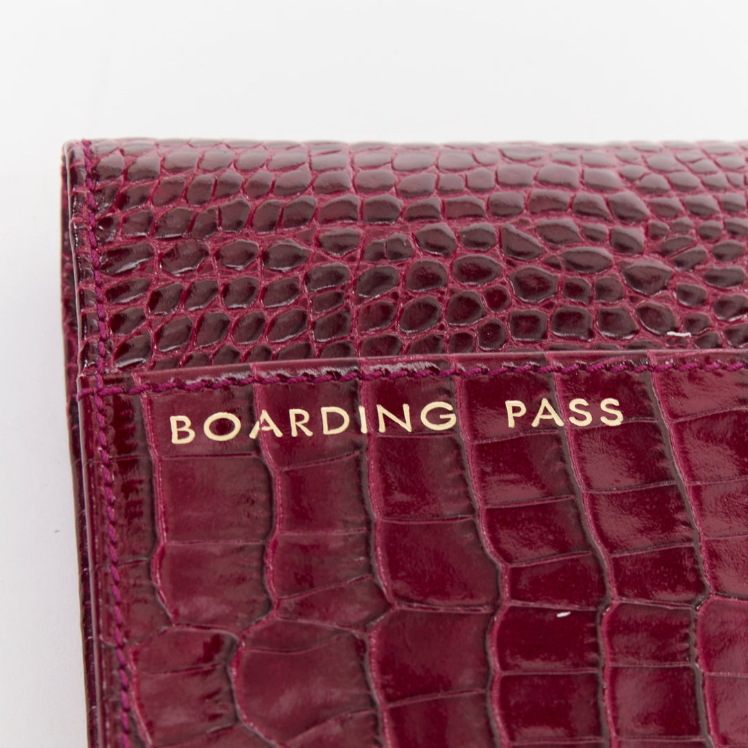 SMYTHSON Mara burgundy croc embossed high gloss teal clasp passport cover