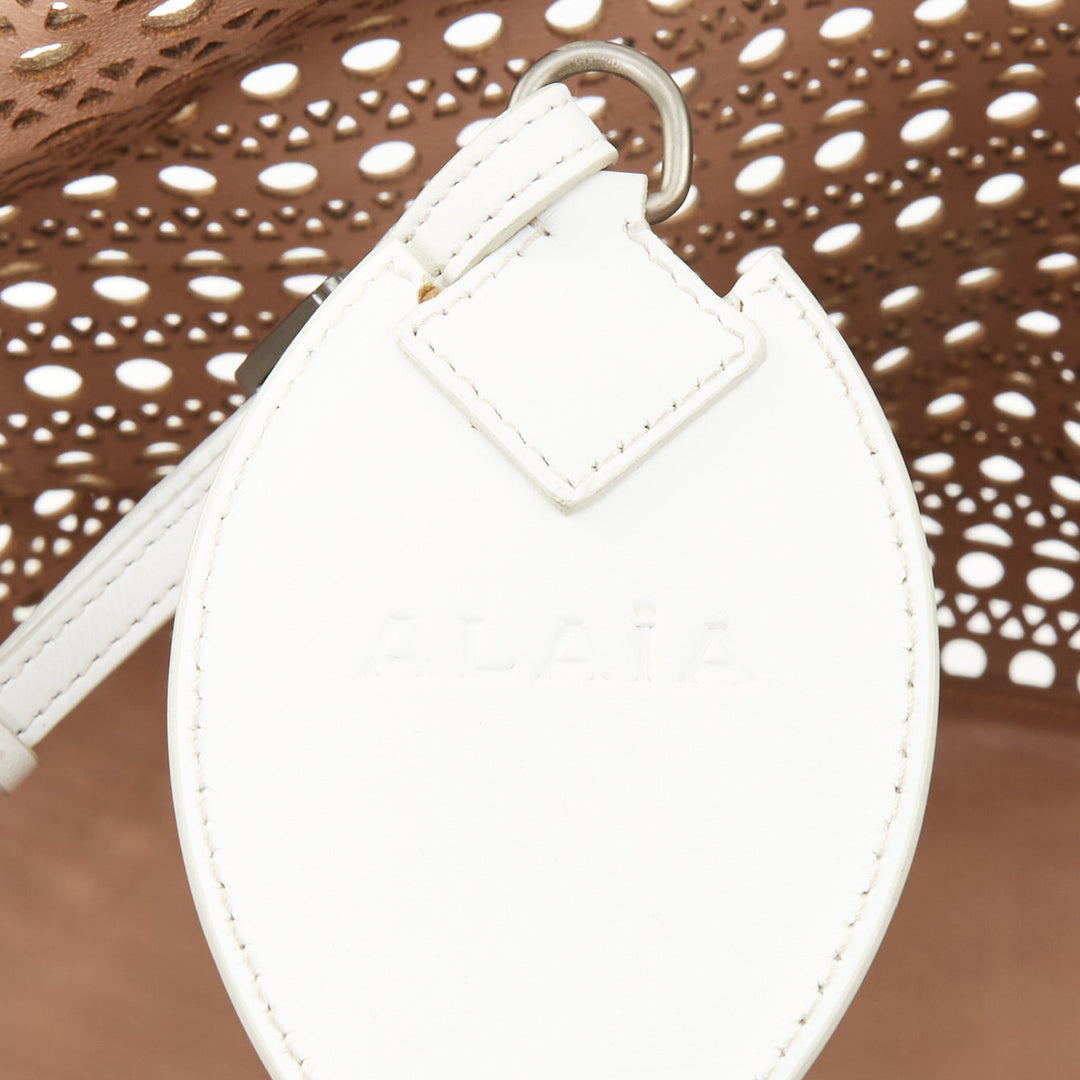 ALAIA Le Mina Vienne Wave laser cut white calfskin leather travel tote bag