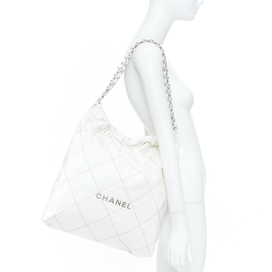 CHANEL 2022 Runway 22 Medium white quilted shiny calfskin silver hobo bag