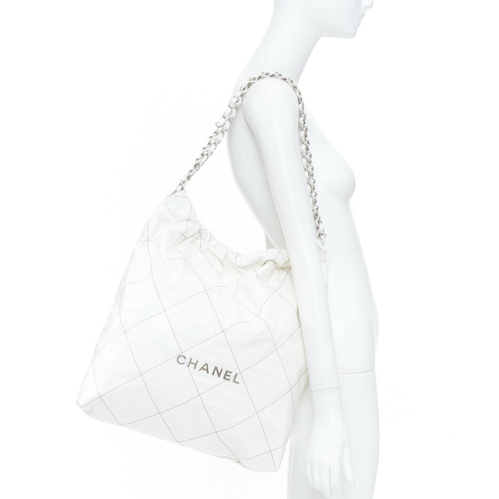 CHANEL 2022 Runway 22 Medium white quilted shiny calfskin silver hobo bag