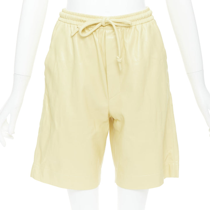 NANUSHKA  Munira Okobor butter yellow vegan leather drawstring bermuda shorts XS