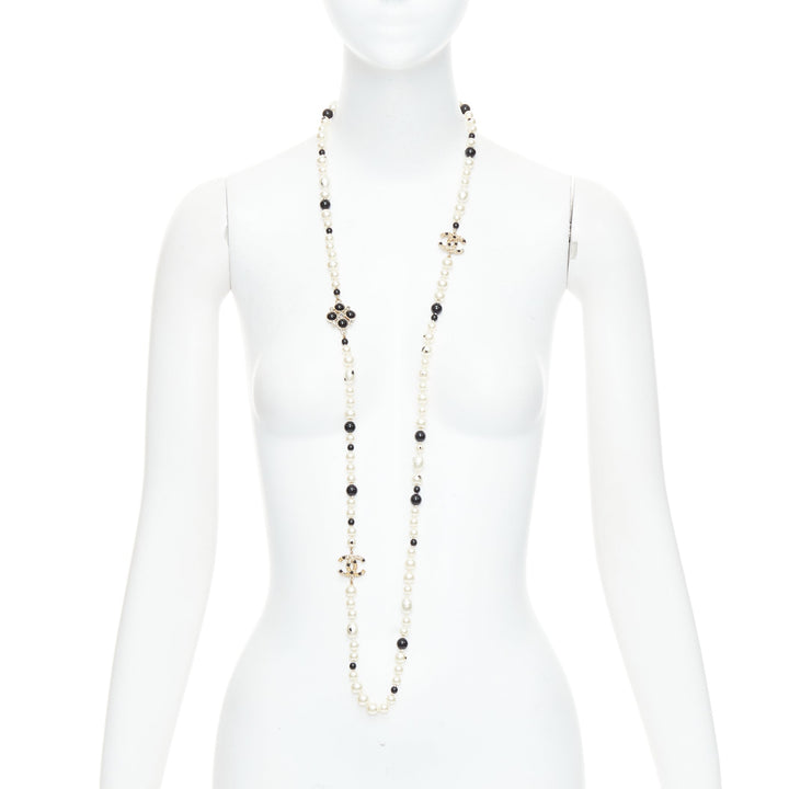 CHANEL 08P black Camelia enamel station faux pearl CC long necklace