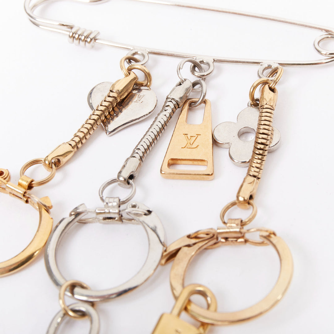 LOUIS VUITTON palladium gold plated pin LV lock heart flower keyring bag charm