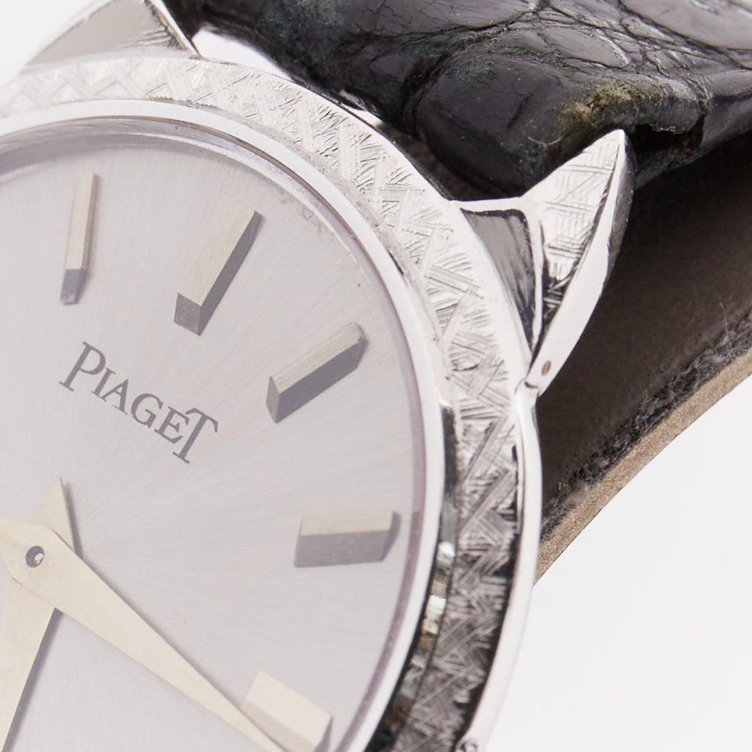 PIAGET Vintage Sunburst Possession silver face black leather logo belted watch