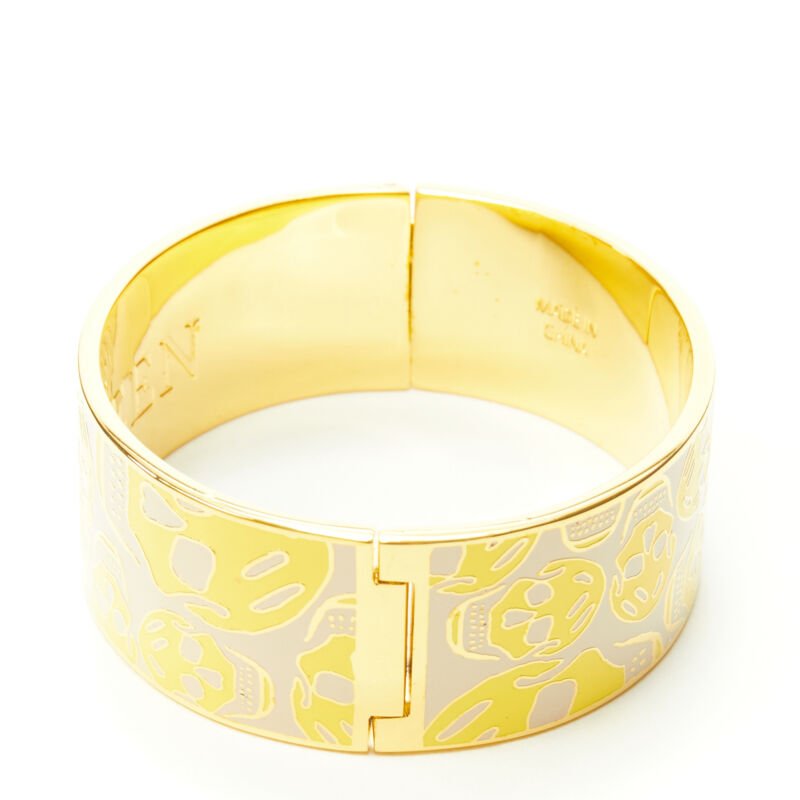 ALEXANDER MCQUEEN beige yellow skull enamel gold tone brass bangle cuff