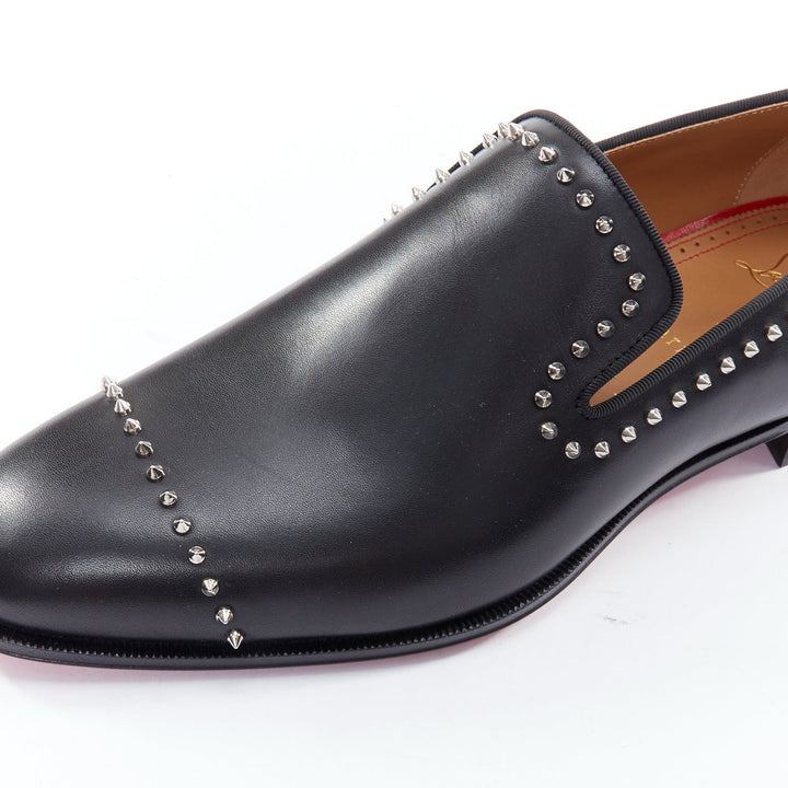 Male mannequin wearing Christian Louboutin Dandy Cloo Black Leather Men Loafer in Size EU43 | Available at JHROP