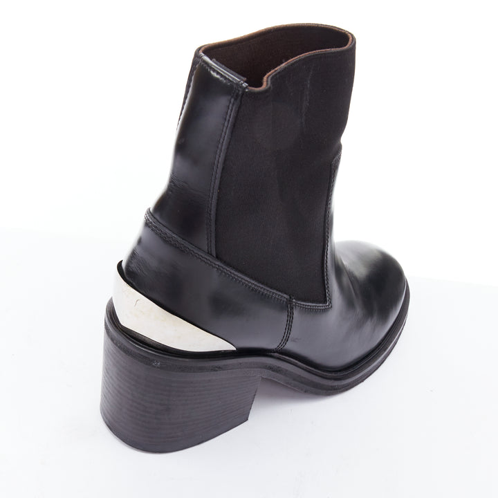 Female mannequin wearing Acne Studios Dion Black Leather Women Boots in Size EU38 | Available at JHROP